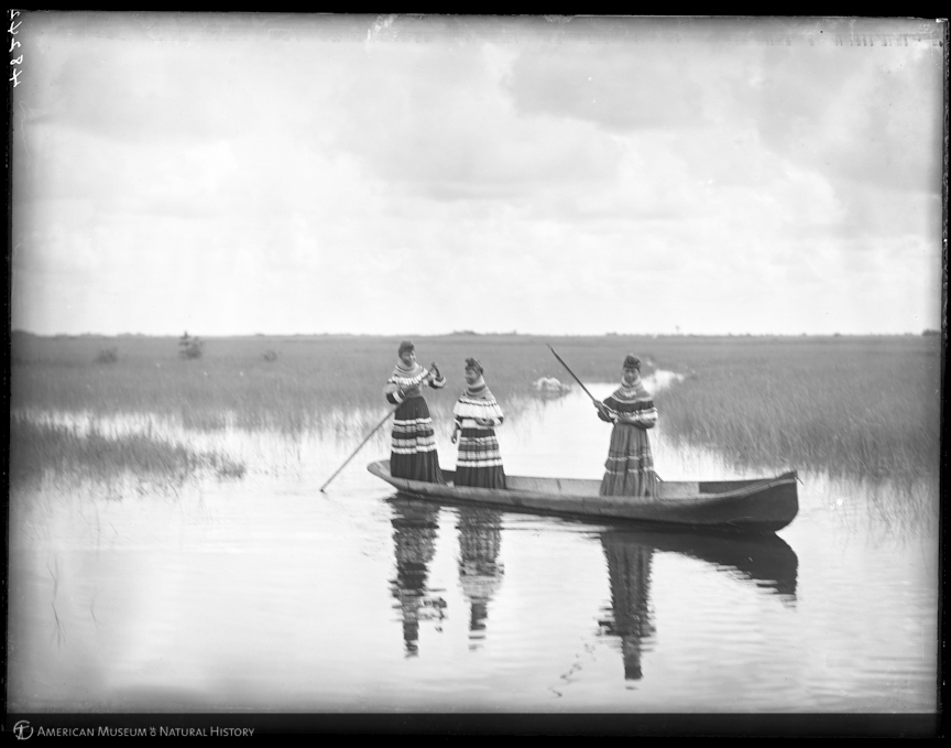 Three Seminole girls in canoe, The Everglades, Florida, 1907; source: Julian Dimock Collection, American Museum of Natural History